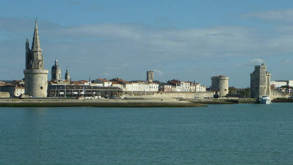 La Rochelle harbour on a calm, sunny day.