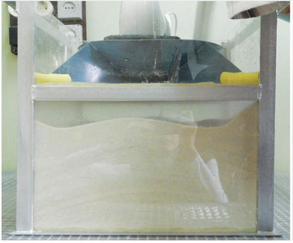 Figure 3: Glass cube completely backfilled by test rig with rotor