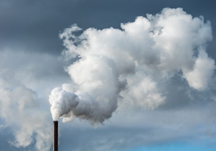 Pollution,From,An,Industry,Chimney,Blowing,A,Large,White,And