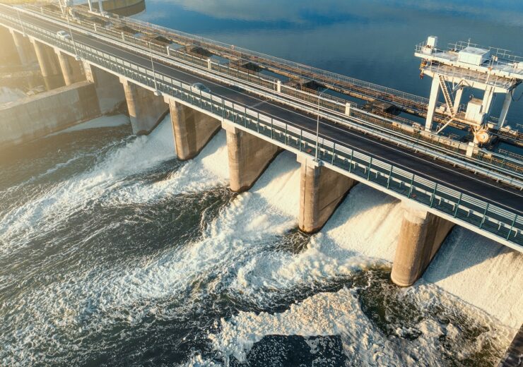 Hydroelectricity,Power,Station,Gates,With,Flowing,Water,,Aerial,View.